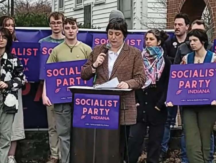 A crowd at a podium with 