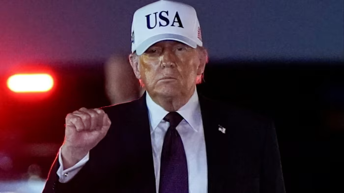 A ragged-looking Trump wearing a 